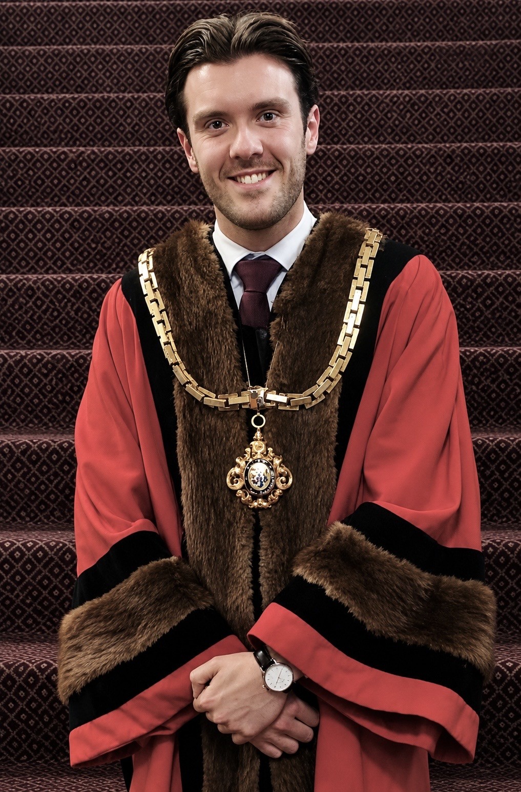 Mayor of Macclesfield, Cllr James Barber-Chadwick, wearing his Mayoral robes and chain after Mayor Making